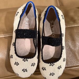 Rothy's Kids Dress Shoes in Black and Cream with Blue Trim